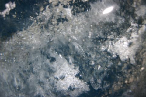 2003 Jeep TJ - Abstract texture of ice and snow formations with dark water.