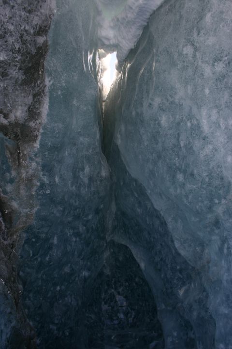 2003 Jeep TJ - Light shines through a crevice in a blue ice cave formation.