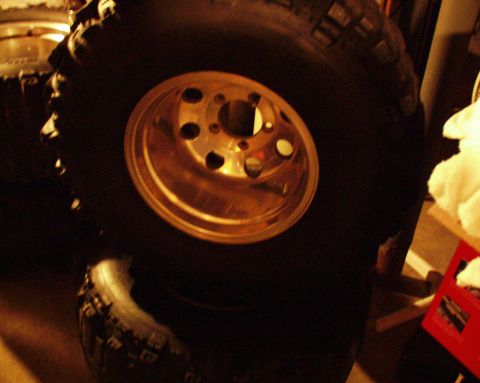 1989 Ford Bronco - A tire and wheel are shown in this close-up photo.