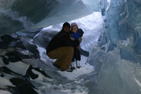2003 Jeep TJ - A man and child pose for a photo inside a glacial ice cave.