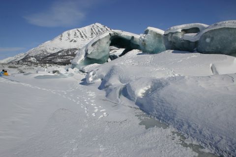 2003 Jeep TJ - A vast snowy landscape with ice formations and a mountain in the background.