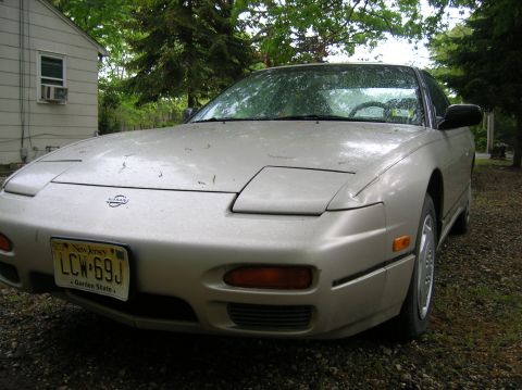 1992 Nissan 240SX - Front view of a 1992 Nissan 240SX parked outdoors.
