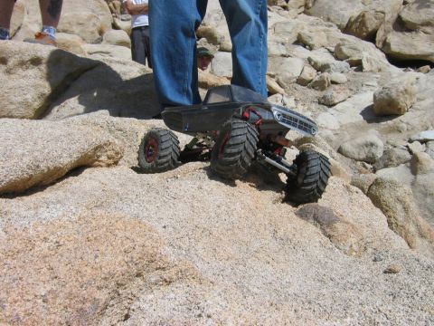 1985 Ford Bronco - A remote control rock crawler navigates a challenging rocky terrain.