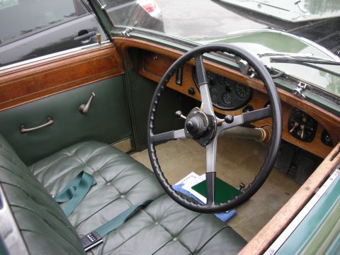 1998 Ford Crown Victoria - Interior view of a classic car, showing the dashboard, steering wheel, and seating.