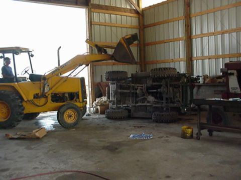 1992 Ford Bronco - held it off the ground by a brace bar!!