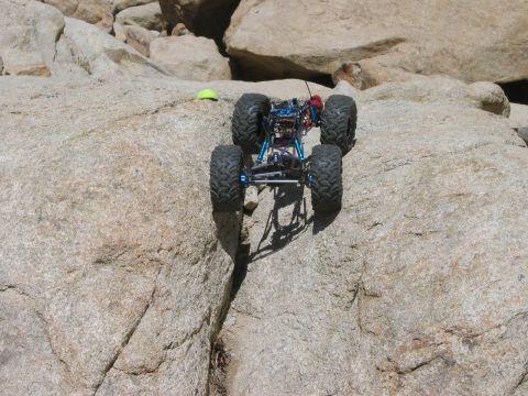 1985 Ford Bronco - A remote control rock crawler navigates a challenging rocky terrain.