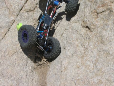 1985 Ford Bronco - This remote control rock crawler is navigating a steep, rocky terrain.