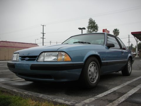 1990 Ford Mustang - Front 3/4 view of a blue 1990 Ford Mustang.