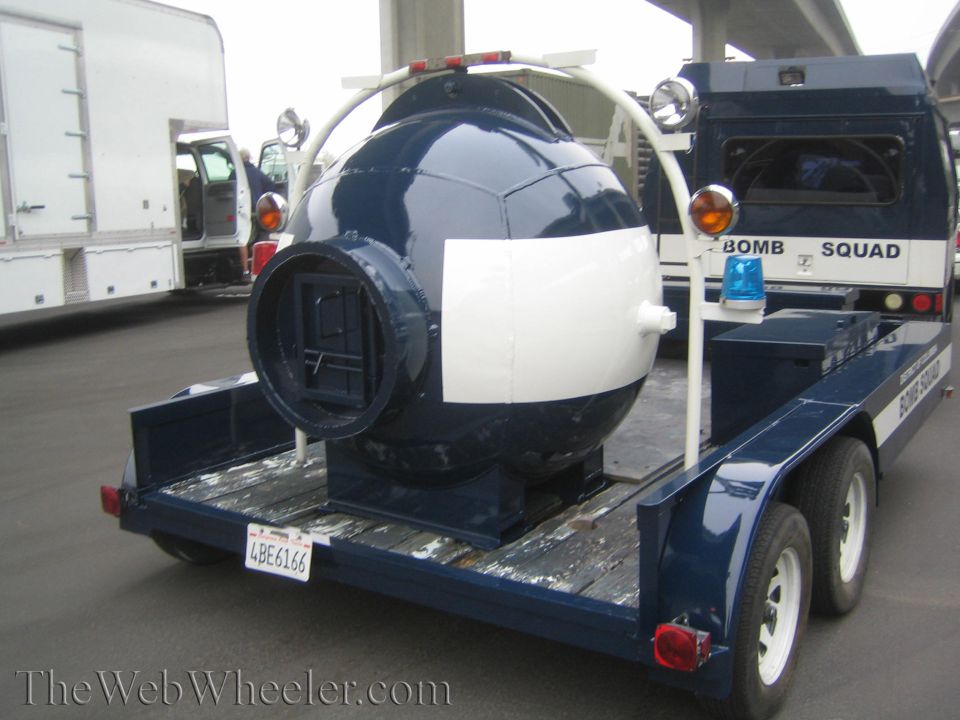 Rear view of a navy bomb-containment sphere on a Bomb Squad trailer