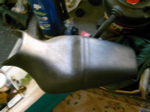1986 Ford Bronco - This dark gray seat features a stitched center seam and appears to be a replacement part.