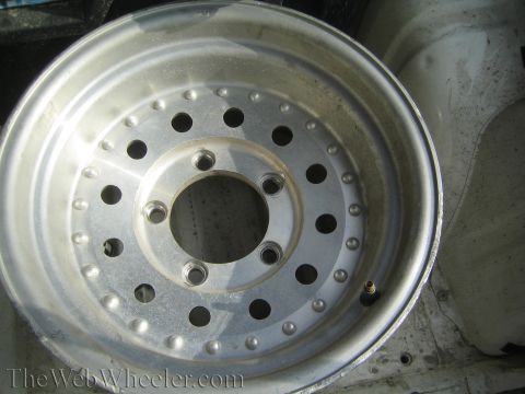 1968 Ford Mustang - Close-up of a single aluminum wheel, not a 1968 Ford Mustang.