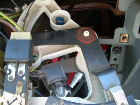 1988 Ford Bronco - A view of various electrical components and wiring within a vehicle's interior.