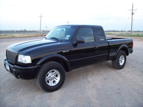 2003 Ford Ranger - Black 2003 Ford Ranger Edge pickup truck seen from the front quarter angle.