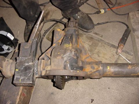 1992 Ford Bronco - Differential housing and axle assembly, possibly undergoing repair or modification.