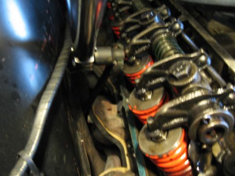 1968 Shelby GT500 - Close-up view of the engine's valve train components, prominent orange springs.