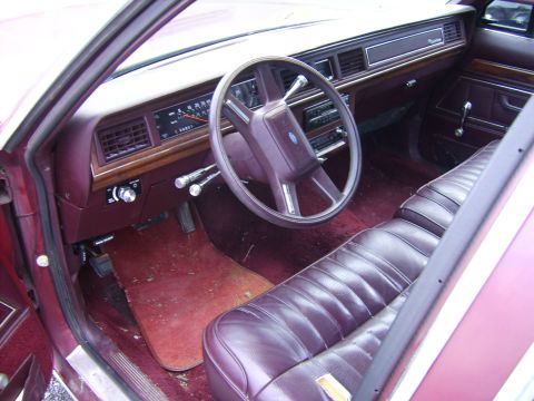 1982 Ford LTD Crown Victoria - Interior view of a 1982 Ford Crown Victoria LTD, showing the dashboard, steering wheel, and seating.