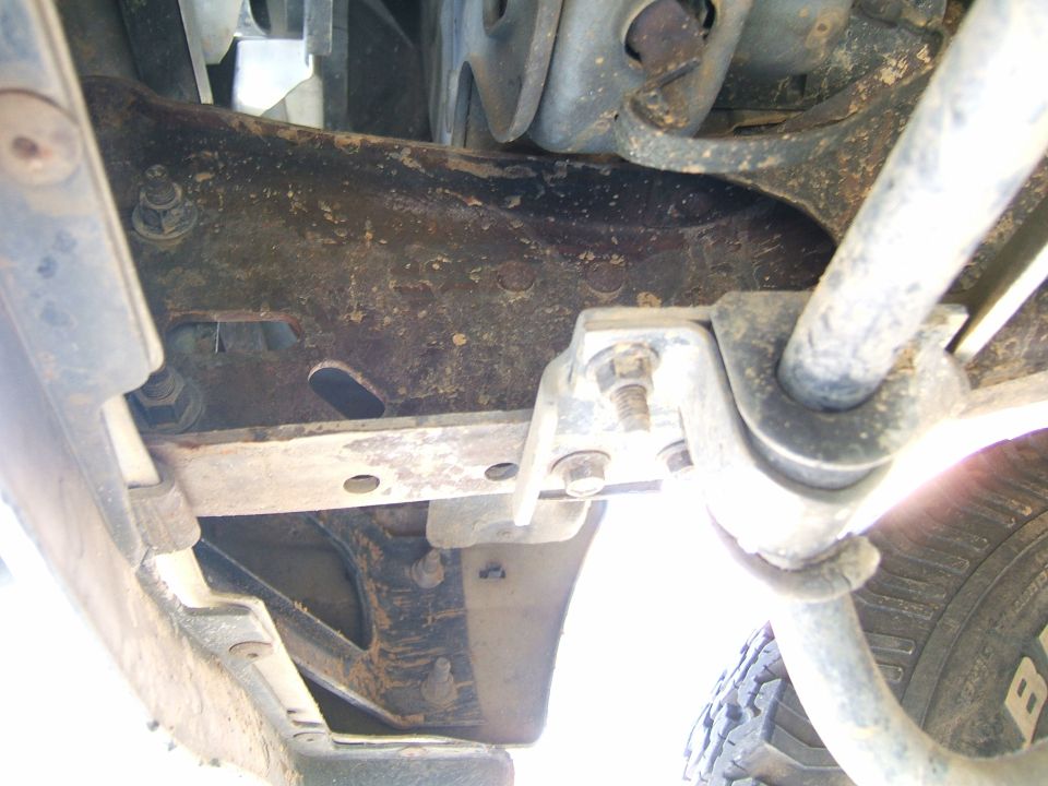 Frame and suspension components with visible tire tread