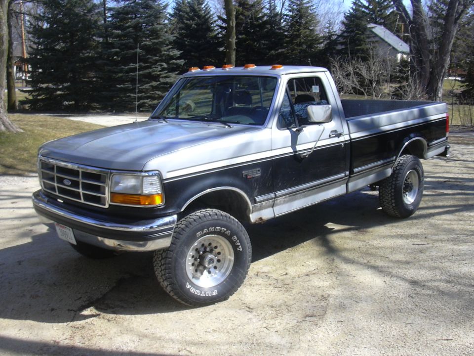 Two-tone 1992 Ford F-250 pickup truck, front 3/4 view