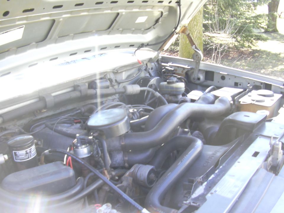 1992 Ford F-250 engine bay with hood open