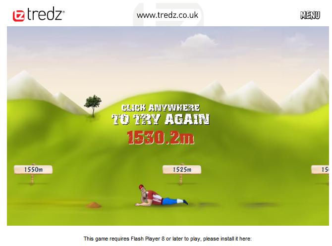 Screenshot of a web game showing a cartoon character lying on a green hill with distance markers