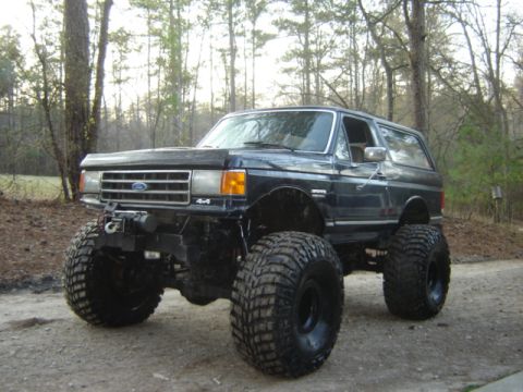 1989 Ford Bronco - This modified Ford Bronco sits high on massive tires, ready for off-road adventure.