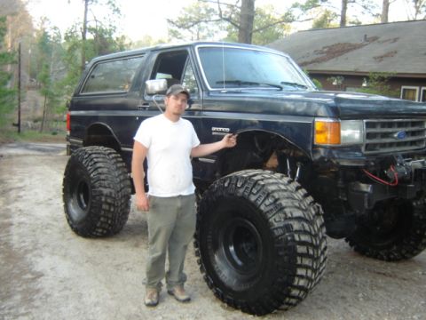 1989 Ford Bronco - This heavily modified 1989 Ford Bronco features extreme lift and oversized tires for off-road capability.