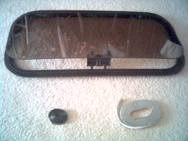 35" x 17" sunroof should cover that hole, just gotta hope that it seals!