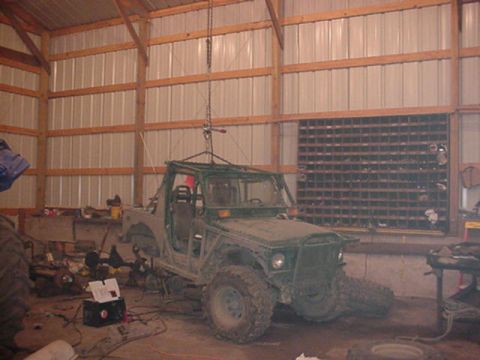 1992 Ford Bronco - first day of swap. removed all the crap in the rear, made rear axle perches, found shackles, welded/bolted on adaptors to move front hanger…