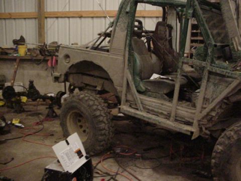 1992 Ford Bronco - checking clearence. it will drop 2-4 more inches than this once the axle is mounted when it picked up by the frame.