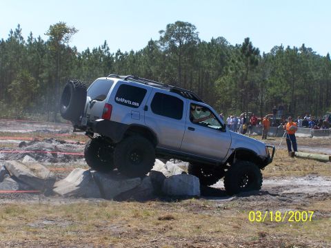 1989 Ford Bronco - A silver SUV tackles an off-road obstacle course on March 18, 2007.