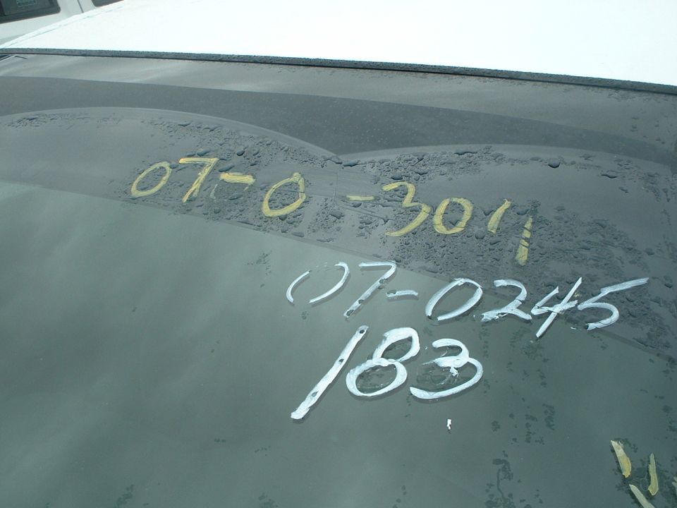 Windshield has handwritten numbers: 07-0-3011, 07-0245, and 183. Supermotors.net logo at bottom right