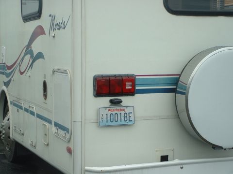 2000 Ford Crown Victoria - This RV has a spare tire mounted on the rear and a Washington license plate.