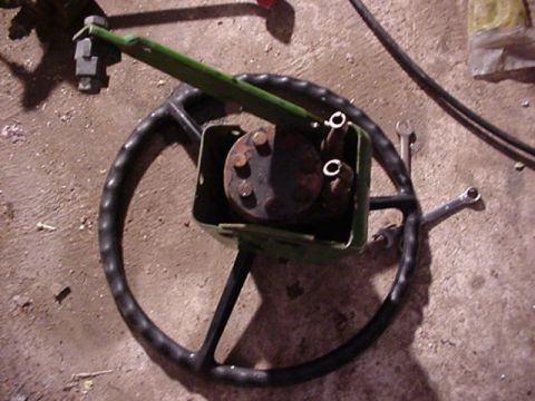 1992 Ford Bronco - Close-up of a steering column and linkage, possibly for a vehicle restoration project.