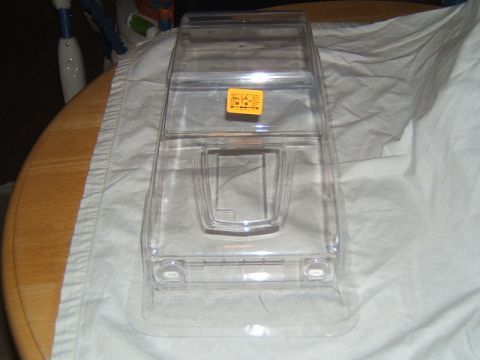 1988 Ford Bronco - A clear plastic RC car body shell is shown from the front, resting on a white cloth.