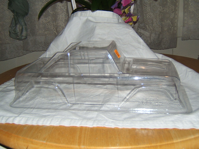 Clear plastic RC car body, side view