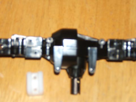 1988 Ford Bronco - RC crawler axle assembly shown on a wooden surface.