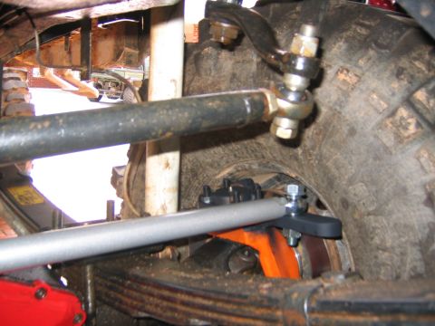 1979 Ford Bronco - Undercarriage view of steering linkage and suspension components, likely during a rebuild or modification.