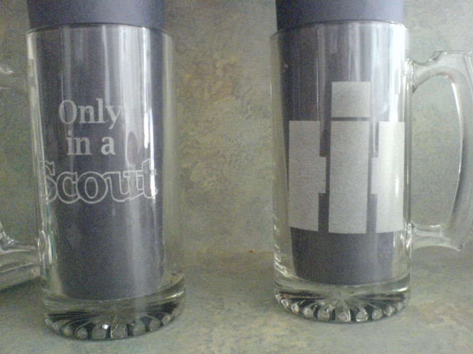 Beer mug with 'Only in a Scout' text and another with IH logo