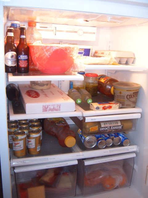 1988 Ford Bronco - Contents of a refrigerator, including beverages, food items, and condiments.