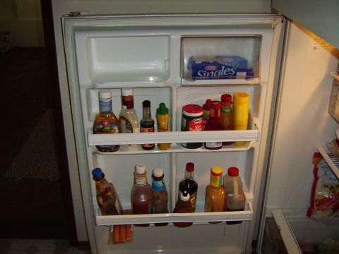 1989 Ford Bronco - Refrigerator interior with condiments and Kraft Singles. The album claims this is a 1989 Ford Bronco.