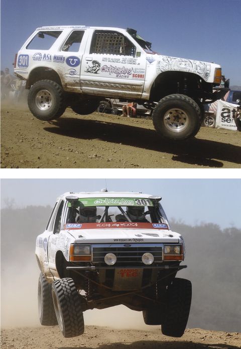 1992 Ford Explorer - Modified 1992 Ford Explorer jumps during an off-road race, displaying sponsor decals and race number 301.
