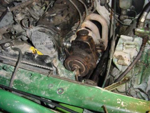 1992 Ford Bronco - Close-up view of the engine bay, showing various components and hoses.