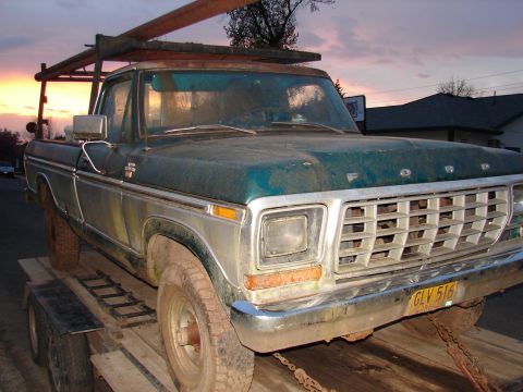 1996 Ford Bronco - This Ford F-250 truck, likely from the mid-1970s, is loaded onto a trailer.