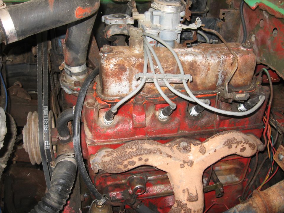 Engine block with spark plug wires and carburetor
