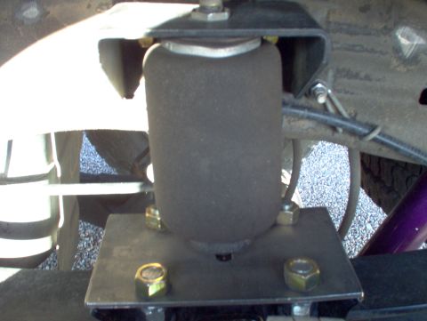1995 Ford Bronco - A close-up view of an air suspension component, likely part of an aftermarket upgrade.