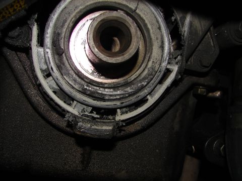 1992 Ford Taurus - Close-up view of a damaged crank pulley assembly, showing wear and tear on the component.
