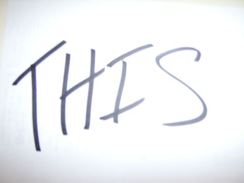 1989 Ford Bronco - Handwritten text 'THIS' is visible on a white background.