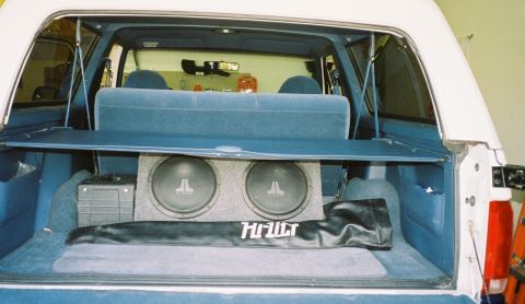 1996 Ford Bronco - The cargo area of a 1996 Ford Bronco is fitted with a custom subwoofer enclosure and audio equipment.