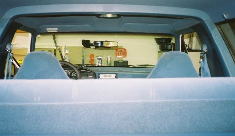 1996 Ford Bronco - Interior view of a 1996 Ford Bronco, showing the dashboard and seats.