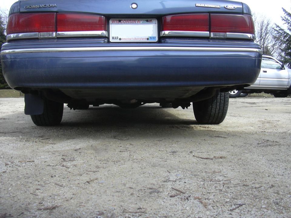 1996 Ford Crown Victoria rear bumper and underside, Wisconsin plate visible